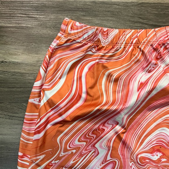 Orange and pink skirt on a size extra small. - Picture 3 of 4